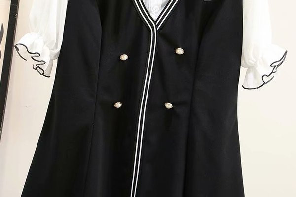 Μοντέρνο γυναικείο φόρεμαμε 3/4 μανίκια σε μαύρο χρώμα με λαιμόκοψη O