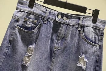 Μοντέρνα γυναικεία φούστα denim με χαραγμένα μοτίβα και τσέπες σε μπλε χρώμα