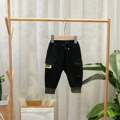 Sport gyereknadrág fekete és szürke zsebekkel