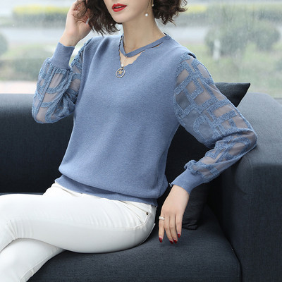 New model women`s sweater with a metal element and transparent sleeves in several colors