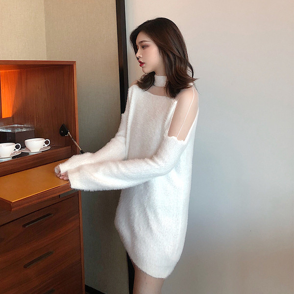 Χνουδωτό γυναικείο πουλόβερ από ασήμι σε μαύρο και άσπρο χρώμα