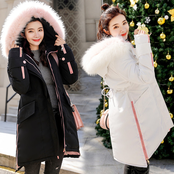 Női téli kabát aszimmetrikus modell és színes pehely