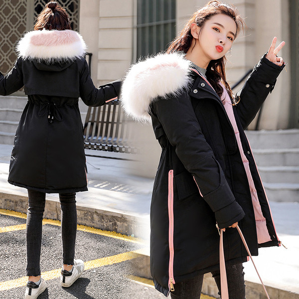 Női téli kabát aszimmetrikus modell és színes pehely