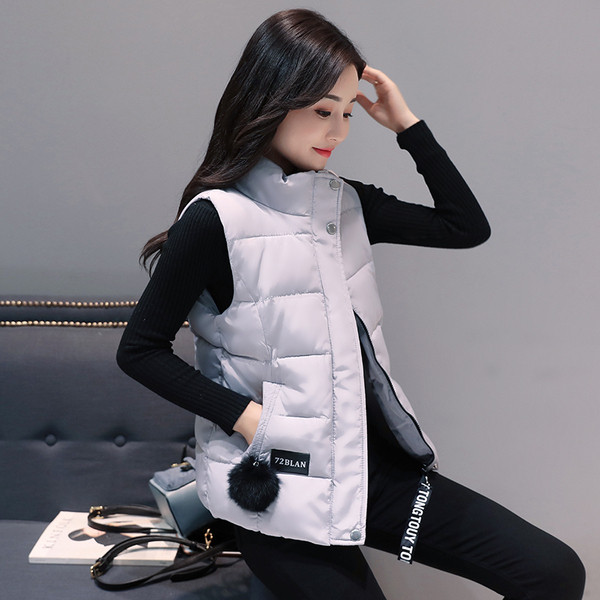 Alkalmi női mellény rövid modell magas gallérral