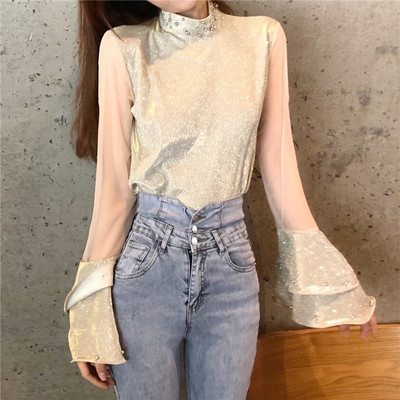 Stílusos női blúz tüll ujjal és magas gallérral arany és ezüst színben