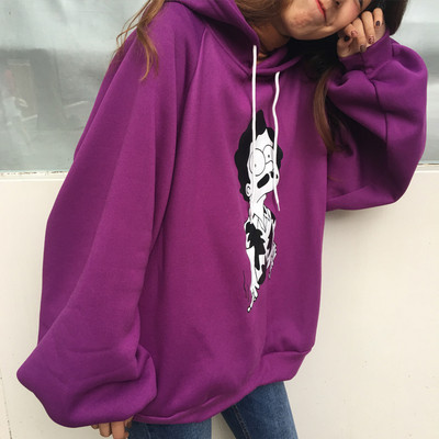 Női téli pulóver színes applikációval - széles modell