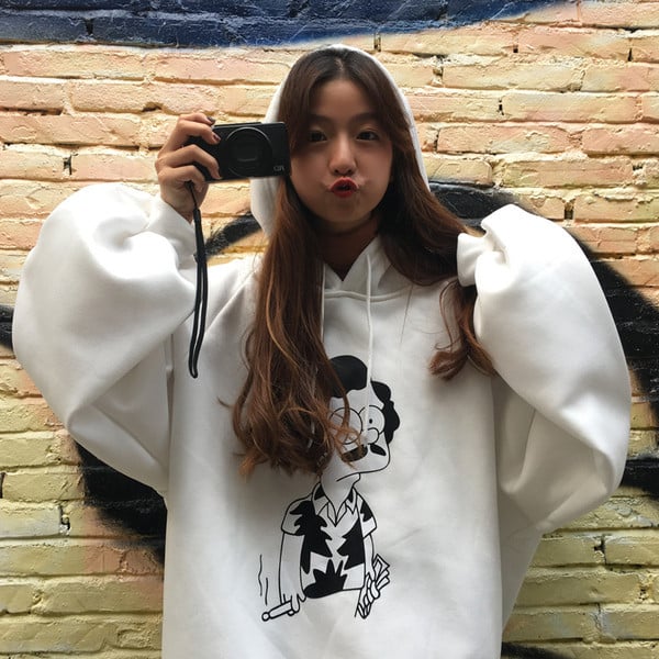 Női téli pulóver színes applikációval - széles modell