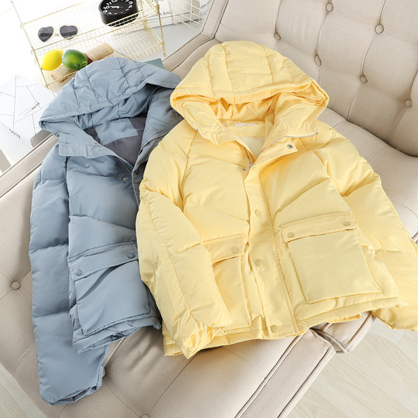 Női téli kabát kapucnival és zsebekkel, négy színben