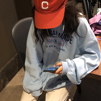 Női alkalmi blúz széles modell felirattal