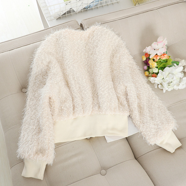 Νέο μοντέλο απαλή γυναικεία ζακέτα με οβάλ λαιμόκοψη σε μαύρο και άσπρο χρώμα