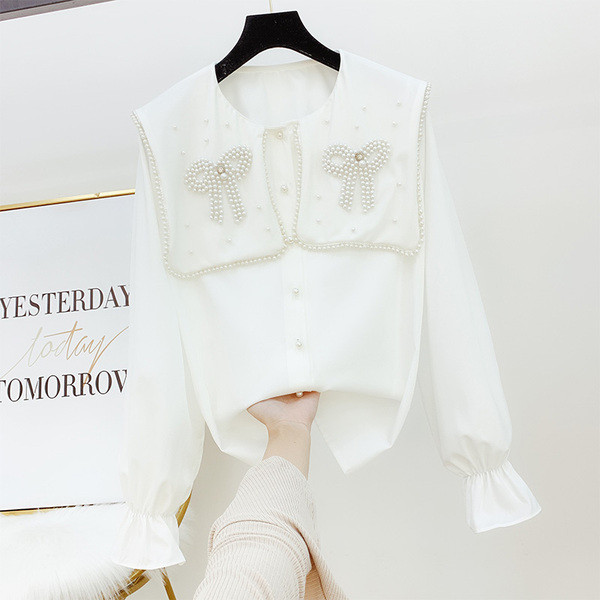 Modern női ing gyöngyökkel, fehér színben
