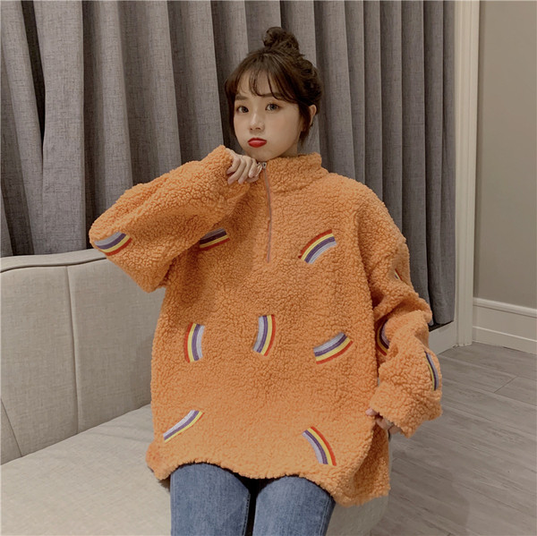 Narancssárga színű puha női pulóver, széles cipzáras modellel