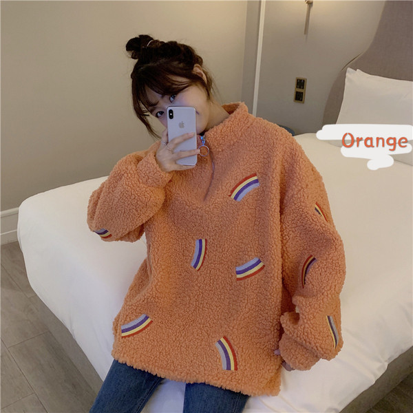 Narancssárga színű puha női pulóver, széles cipzáras modellel