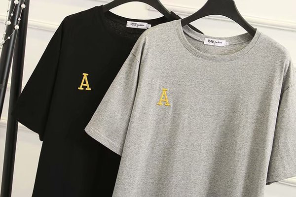 Alkalmi női ruha aszimmetrikus modell rövid ujjú szürke és fekete színben