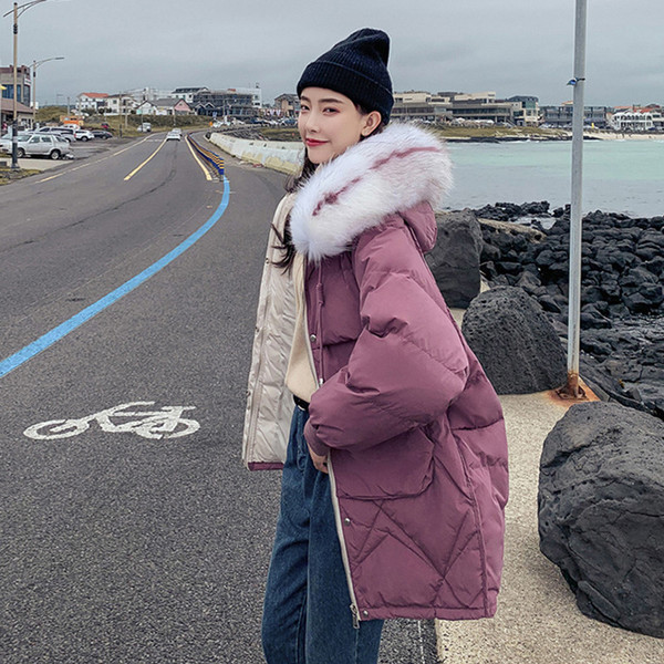 Női téli kabát, kapucniján színes pehely