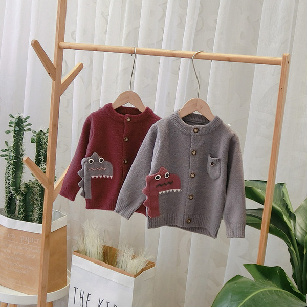 Modern gyerekmellény szürke és piros 3D elemekkel