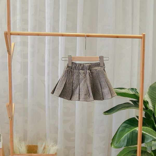 Κομψή παιδική πλισε φούστα φούστα με κουμπιά