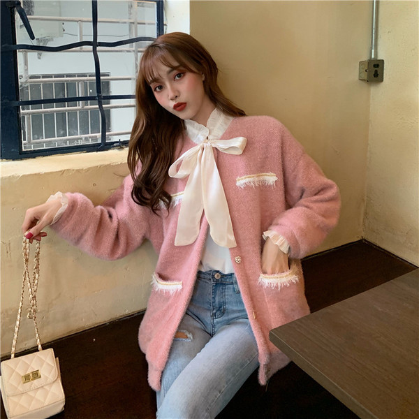 Rózsaszín női topikamellény, zsebekkel