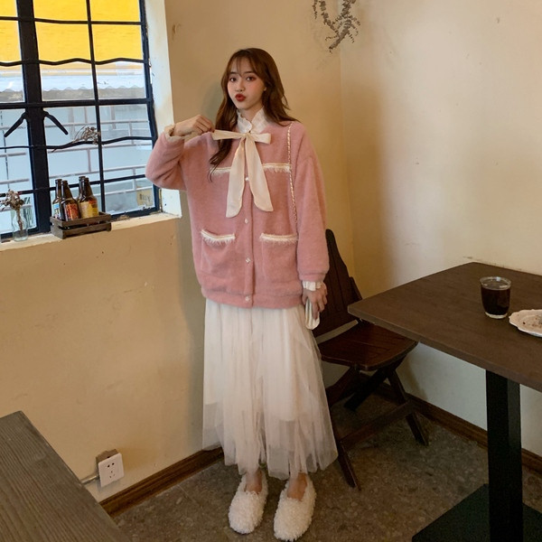 Rózsaszín női topikamellény, zsebekkel