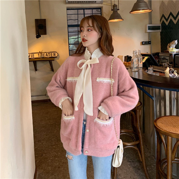 Rózsaszín női topikamellény, zsebekkel