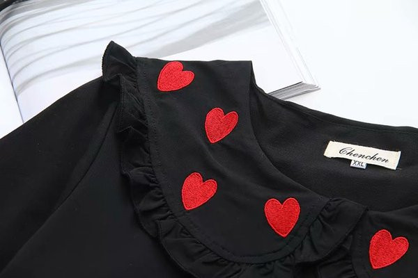 Alkalmi női rövid ruha rövid ujjal és O-nyakú fekete színben