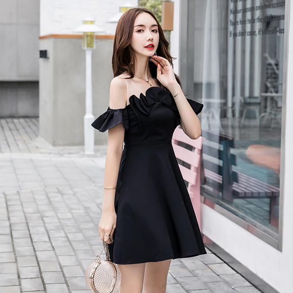 Model modern de rochie de dama croiala in negru si albastru