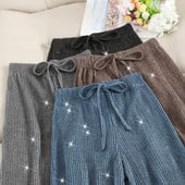 Divatos, fényes hatású, rugalmas női nadrág több színben