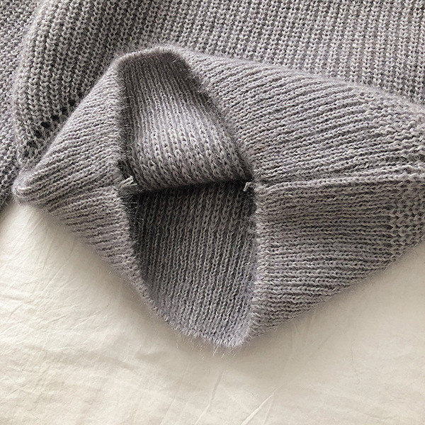 Új modell modern női pulóver ejtett ujjal több színben