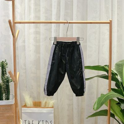 Нов модел детски панталон с кант за момчета в черен цвят