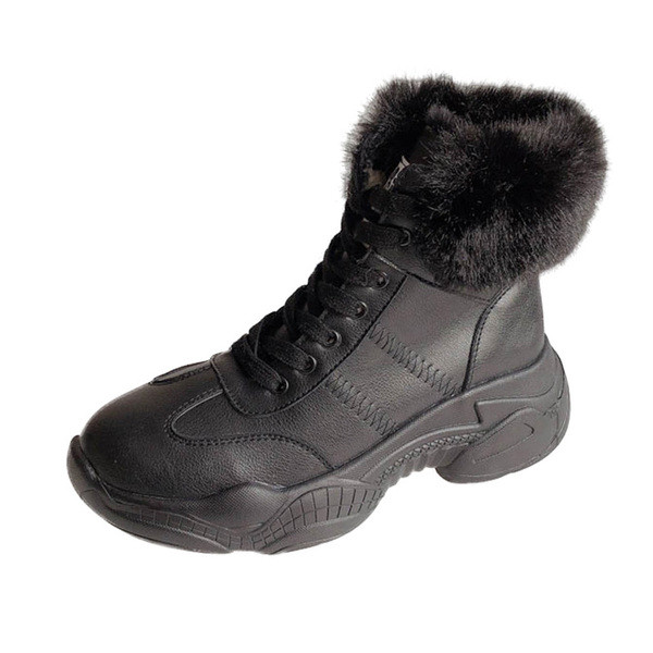 Μοντέρνες γυναικείες μπότες από οικολογικό δέρμα σε μαύρο και άσπρο χρώμα