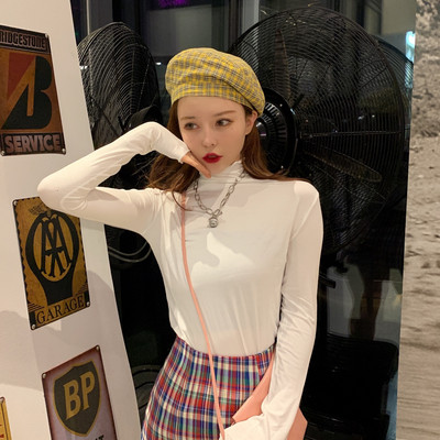 Női alkalmi blúz több színben, magas gallérral