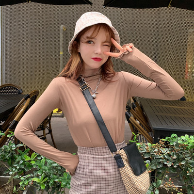 Női alkalmi blúz több színben, magas gallérral