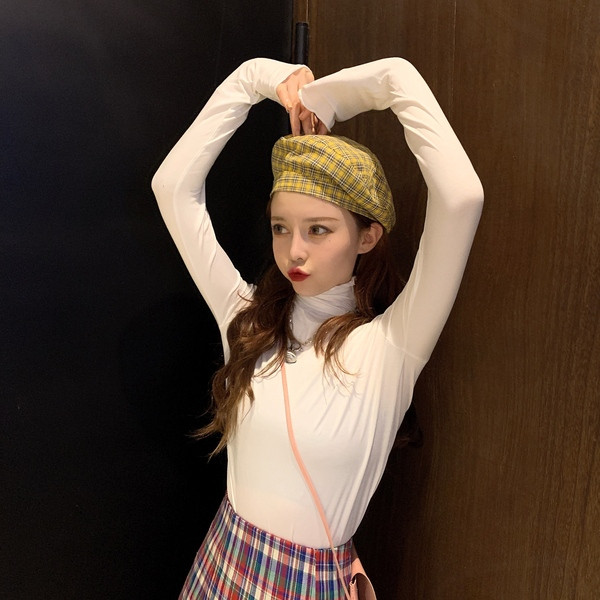 Női alkalmi blúz több színben, magas gallérral