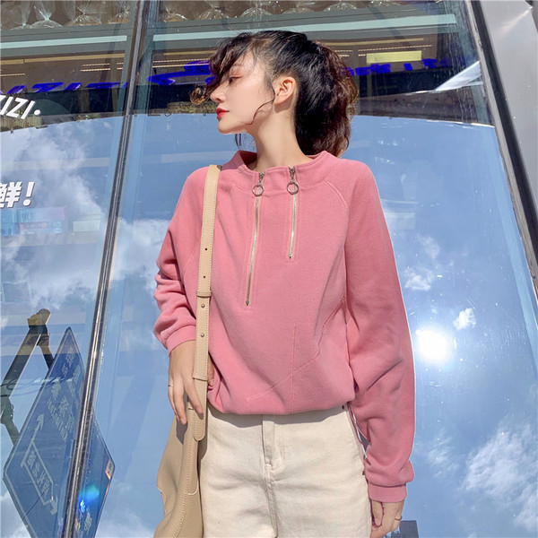 Γυναικεία μοντέρνα μπλούζα σε άσπρο ροζ και μαύρο χρώμα με φερμουάρ