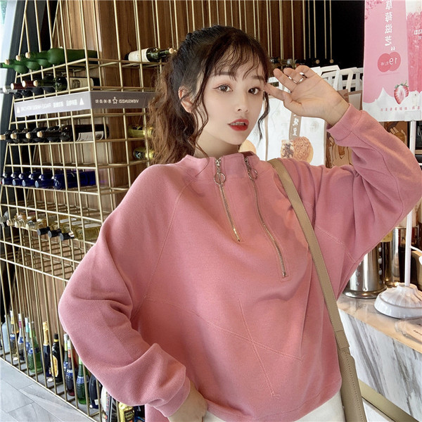 Γυναικεία μοντέρνα μπλούζα σε άσπρο ροζ και μαύρο χρώμα με φερμουάρ