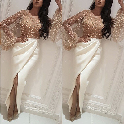 Νέο μοντέλο γυναικείο μακρύ φόρεμα με μακρύ μανίκι και σχισμή σε λευκό χρώμα