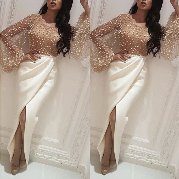 Νέο μοντέλο γυναικείο μακρύ φόρεμα με μακρύ μανίκι και σχισμή σε λευκό χρώμα