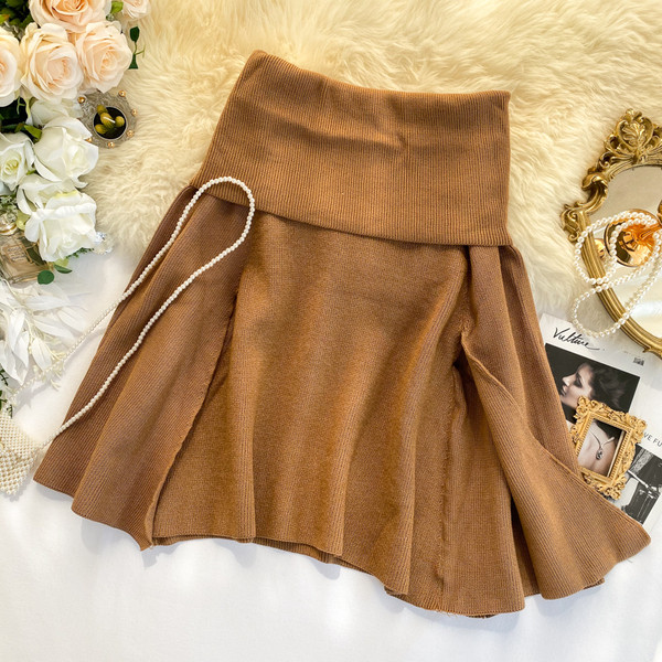 Μοντέρνο γυναικείο πουλόβερ με στρογγυλό ντεκολτέ