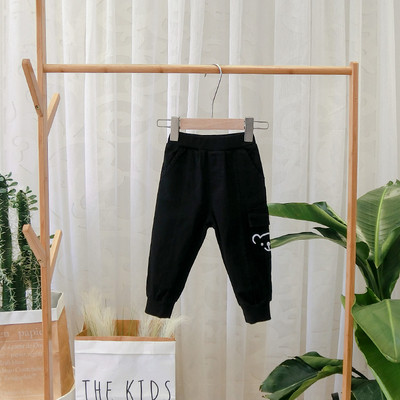 Pantaloni sport pentru copii model nou cu buzunar in negru si maro pentru baieti