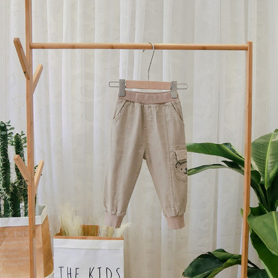 Pantaloni sport pentru copii model nou cu buzunar in negru si maro pentru baieti