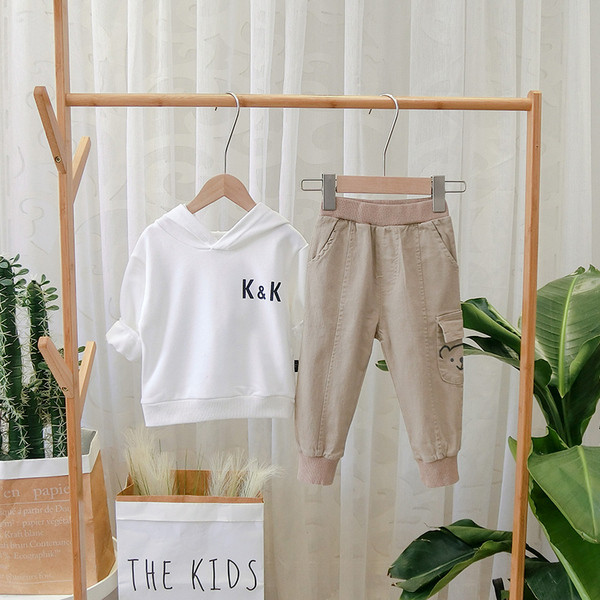 Pantaloni sport pentru copii model nou cu buzunar in negru si maro pentru baieti