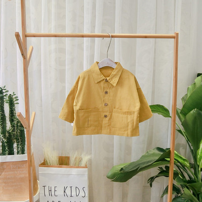 Μοντέρνο παιδικόμπουφάν για το φθινοπώρο για αγόρια με μαύρο και κίτρινο χρώμα με τύπωμα στην πλάτη