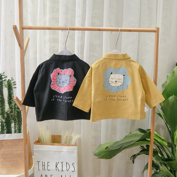 Μοντέρνο παιδικόμπουφάν για το φθινοπώρο για αγόρια με μαύρο και κίτρινο χρώμα  με τύπωμα στην πλάτη