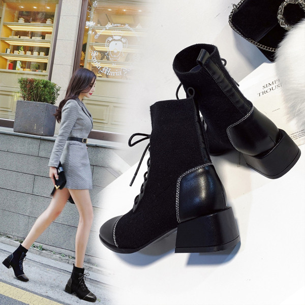 Μοντέρνες γυναικείες μπότες με παχιά τακούνια και  κορδόνια σε μαύρο χρώμα