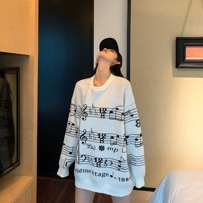 Μακρύ πουλόβερ με εφαρμογή σε λευκό και μαύρο χρώμα