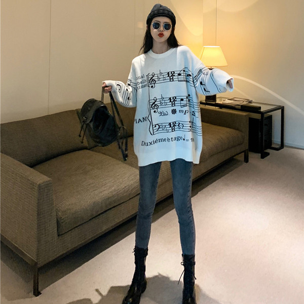 Μακρύ πουλόβερ με εφαρμογή σε λευκό και μαύρο χρώμα