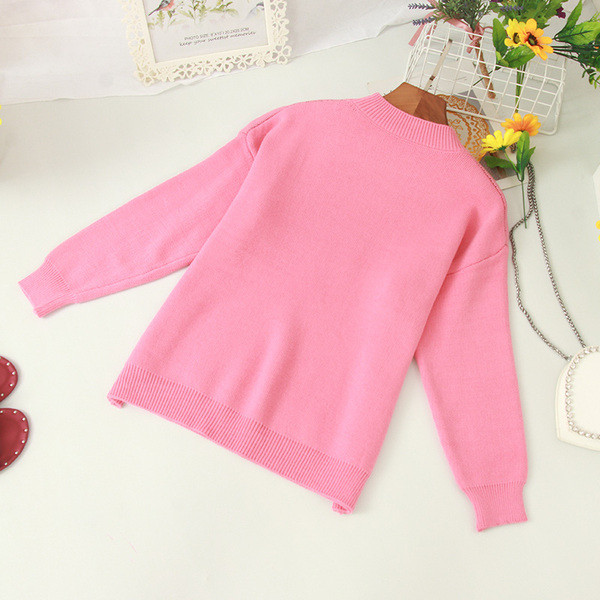 Modern női pulóver ovális nyakkivágással és rátéttel több színben