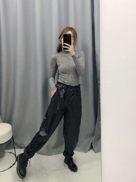 Eco bőrből készült, elasztikus derékkal rendelkező hosszú nadrág - egyenes modell