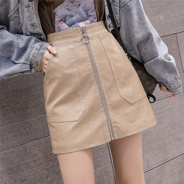 Új modell modern női szoknya cipzárral és zsebekkel fekete, sárga és bézs színben