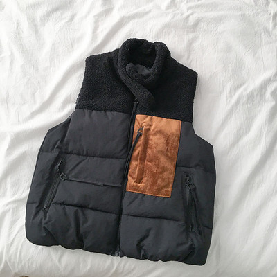 Casual γυναικείο γιλέκο με φερμουάρ και ψηλό γιακά σε λευκό και μαύρο χρώμα